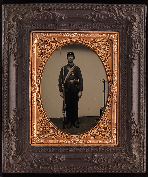 Unknown, [Union Soldier Holding Rifle, with Photographer's Posing Stand]