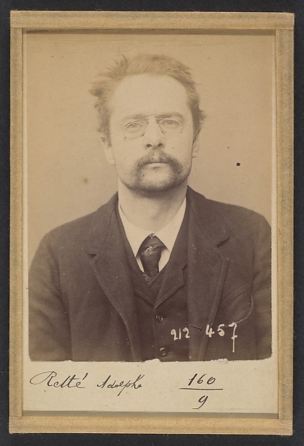 Alphonse Bertillon, Retté. Adolphe. 30 ans, né à Paris IXe. Homme de lettre. Cris séditieux. 21/1/94.