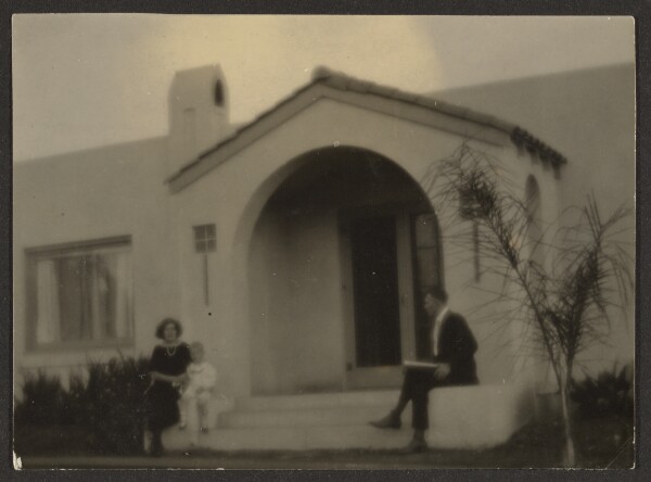 Louis Fleckenstein, [Woman and Man in front of a House]
