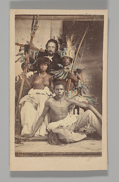 Unknown, [Studio Portrait: Seated Group portrait with Man in European Dress and Three Indigenous people]