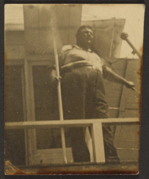 Louis Fleckenstein, [Man Above on Porch]