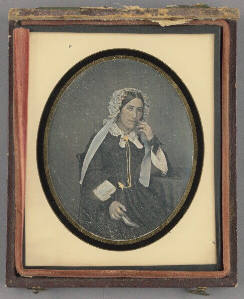 Unknown, [Portrait of a Seated Woman in Bonnet Holding a Book]