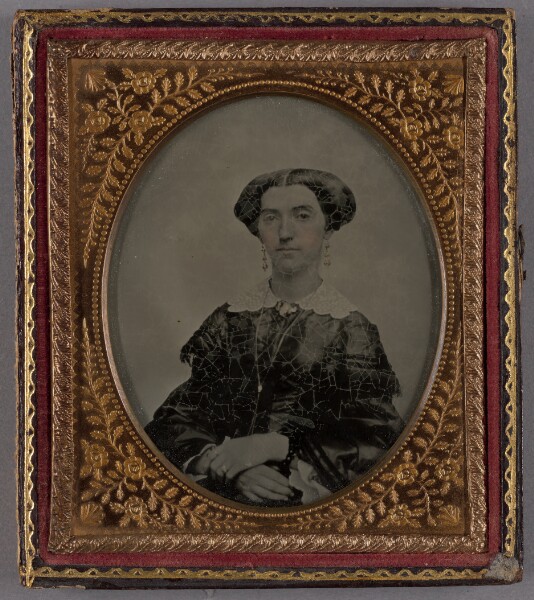 Unknown, [Portrait of a Seated Woman with Hands Crossed]