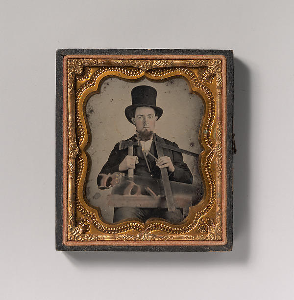 Unknown, [Carpenter in Top Hat with Hatchet, Compass, Square, and Hand Saw]