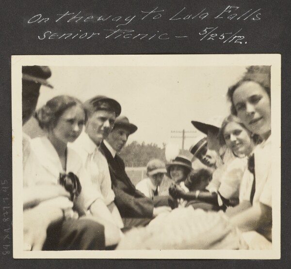 Unknown, [View of Men and Women Sitting in Carriage]