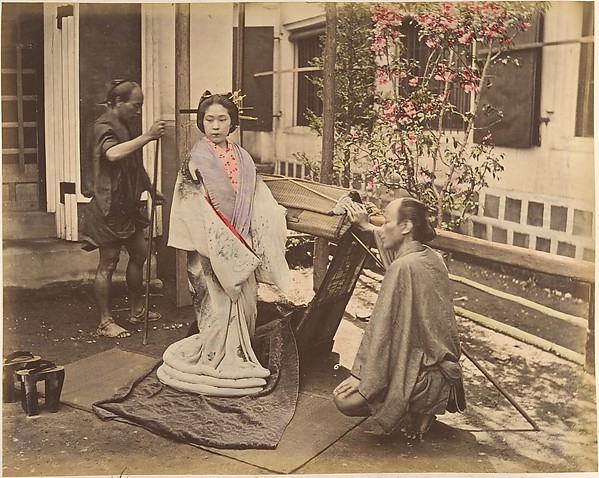 Unknown, [Japanese Woman in Traditional Dress Posing with Two Men]