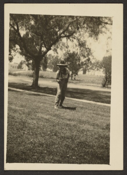 Louis Fleckenstein, [Boy in Cowboy Hat in Yard]