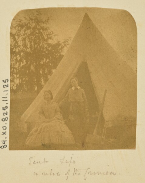 Unknown, [Portrait in front of a tent]