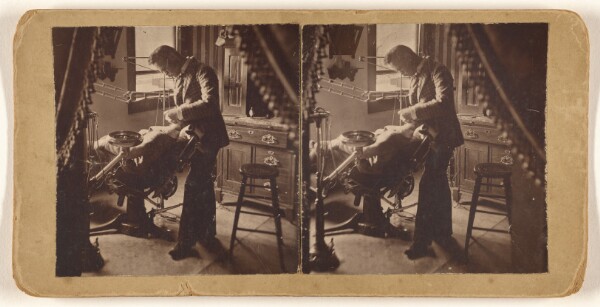 Unknown, [Dentist at work]
