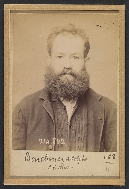 Alphonse Bertillon, Bouchenez. Adolphe. 36 ans, 27/2/94. (En rouge barrant la fiche: "Transféré à Mazas. À faire extraire").
