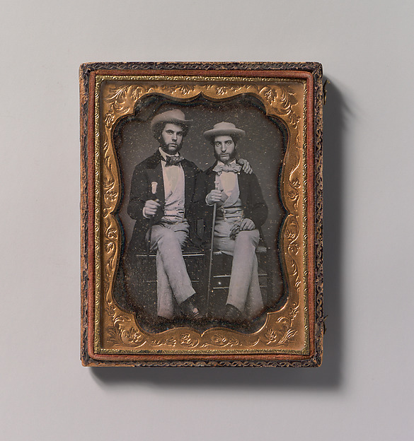 Unknown, [Two Seated Young Men Holding Ivory-topped Walking Sticks]