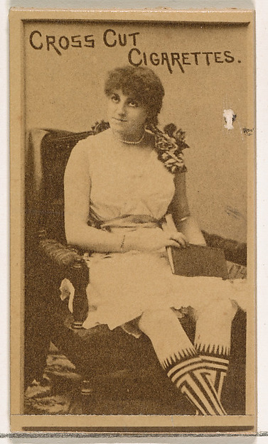 W. Duke, Sons & Co., Seated actress wearing patterned stockings, from the Actors and Actresses series (N145-1) issued by Duke Sons & Co. to promote Cross Cut Cigarettes