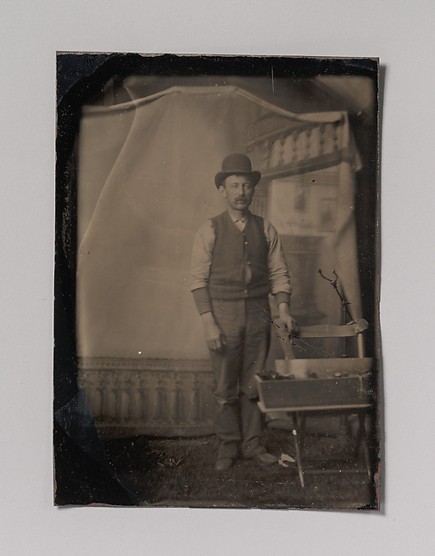 Unknown, [Workman with Tool Box]