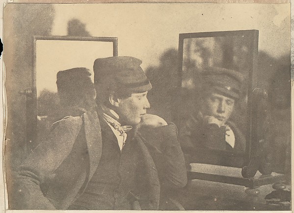 Unknown, [Boy in Profile, Face Shown Frontally in Mirror]