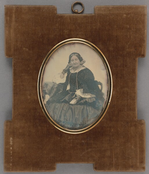Unknown, [Portrait of a Seated Middle-aged Woman Wearing Fingerless Gloves]