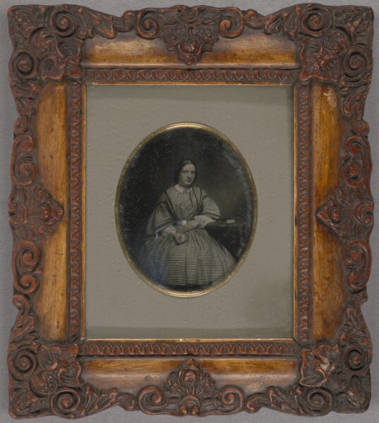 Unknown, [Portrait of a Woman seated at a table]