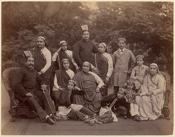 Unknown, [Formal Family Portrait of Thirteen People, Men in European Dress]