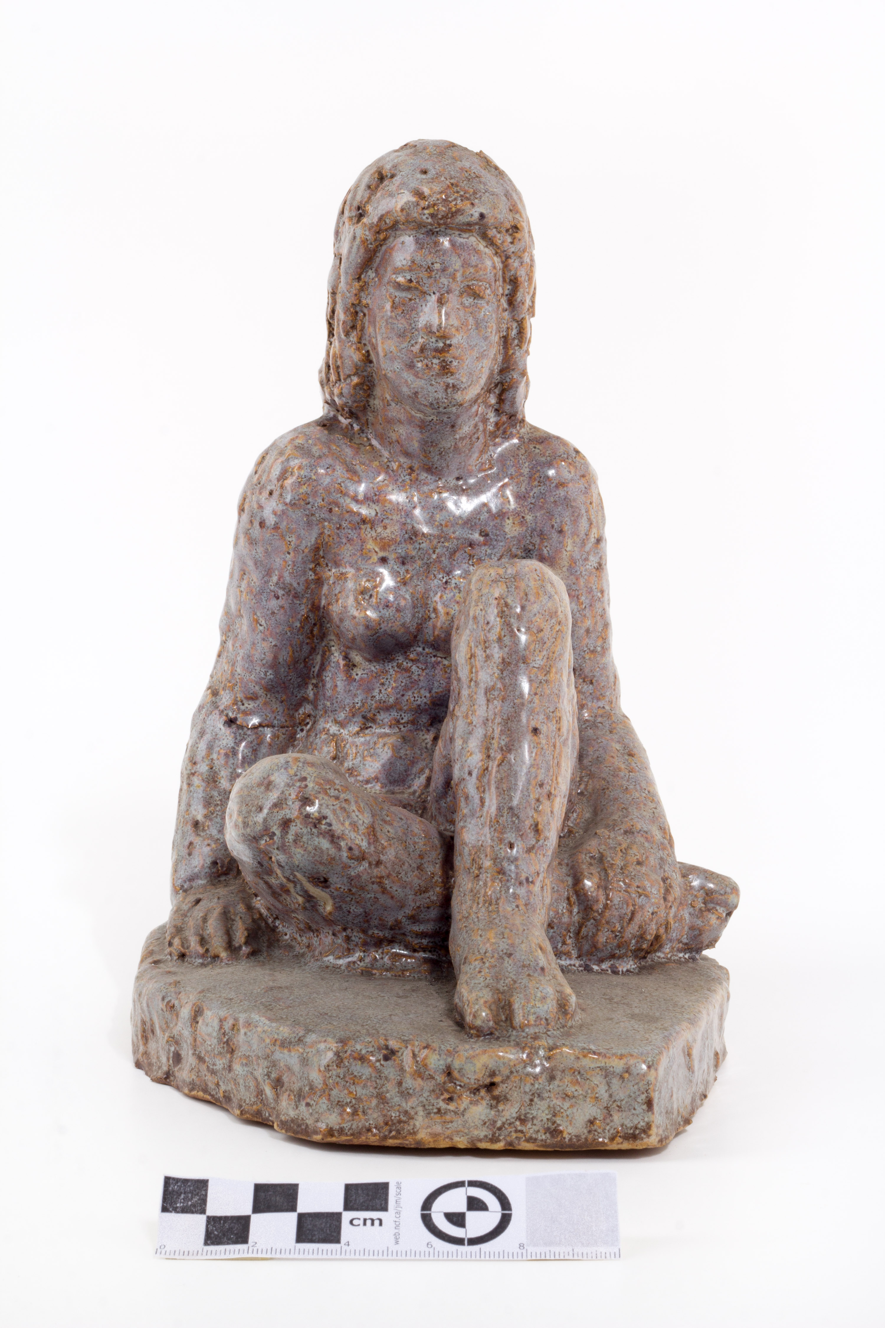 Anton (autor) Starkopf, Istuv naisfiguur