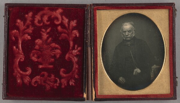 Unknown, [Portrait of a Seated Man with Muttonchop Whiskers Clutching His Long Neck Chain]