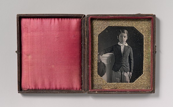 Unknown, [Boy Holding Cap, Resting Arm on a Column]