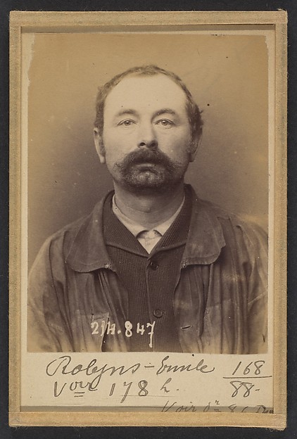 Alphonse Bertillon, Robyns. Émile. 36 ans, né à Lumone (Belgique). Marchand de Pierres (?). Anarchiste. 28/2/94.