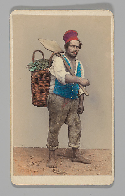 Unknown, [Studio Portrait: Man Carrying Shovel and Basket of Greens]