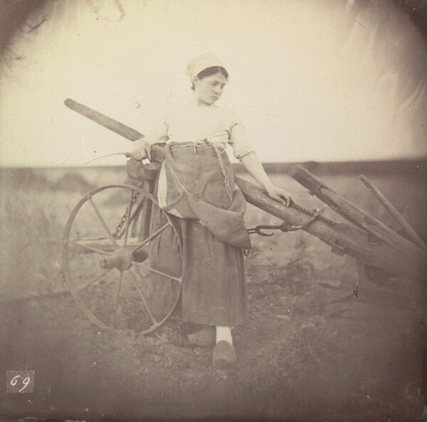 Unknown, [Young woman with plow]