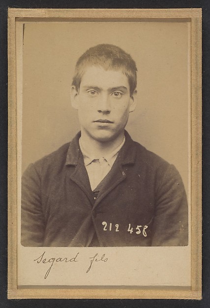 Alphonse Bertillon, Segard. Émilien (dit Segard Fils). 18 ans, né à Saloüel (Somme). Peintre en voitures. Anarchiste. 2/7/94.