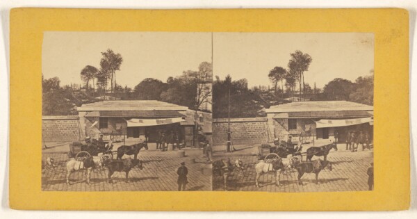 Unknown, [Horse-drawn wagons on a cobblestone street]