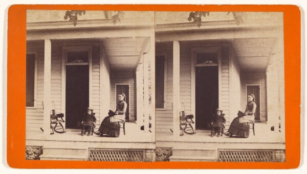 Unknown, [Woman and little girl seated on porch of house]