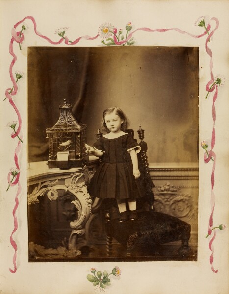 Unknown, [Portrait of young girl with bird cage]