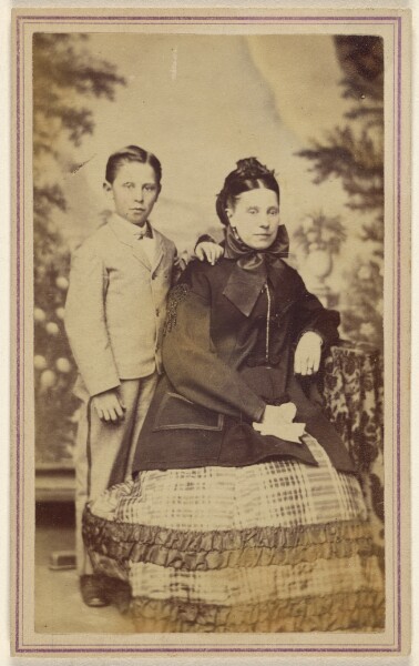 Unknown, [Mother seated, son standing]