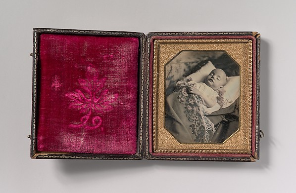 Unknown, [Postmortem Baby, Partially Covered by a Flowered Shawl with a Fringe Hem]