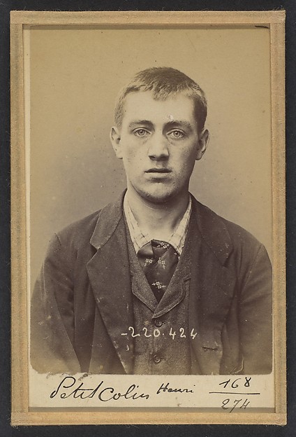 Alphonse Bertillon, Peticolin. Henri. 23 ans, né le 8/6/71 à Goersdorf (Bas-Rhin). Vernisseur. Anarchiste. 2/7/94.